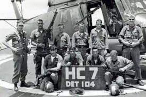 Clyde Lassen and helicopter crew in Vietnam. Press Enter to Activate this item.
