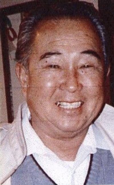 Masami smiles in his 60s. Press Enter to Activate this item.