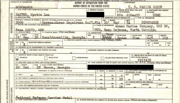 Baker's discharge papers, showing her National Defense Service Medal. Press Enter to Activate this item.