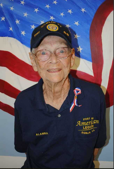 Alanna Maddox Crowder as a Veteran wearing her American Legion shirt and hat.