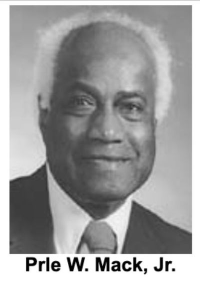 An African American man with white hair in a jacket and tie. Press Enter to Activate this item.